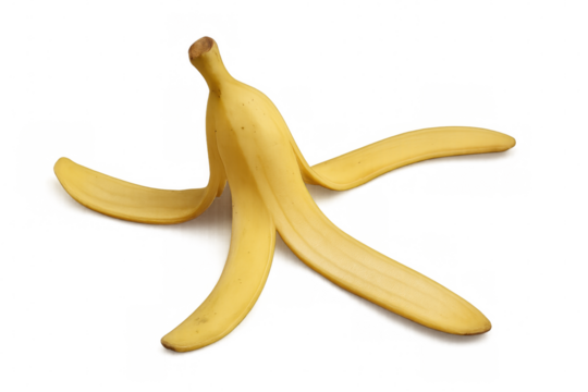 Discarded banana peel lying on clear surface, illustrating potential slipping hazard with comedic undertones of classic physical comedy