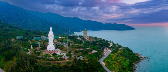Aerial view of linh ung pagoda and lady buddha statue in Da nang at sunset