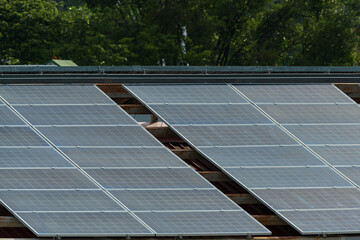 Solar panels row.Solar cells farm on the roof and sunset.Photovoltaic modules for renewable...