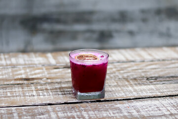 dragon fruit cocktail on wooden table