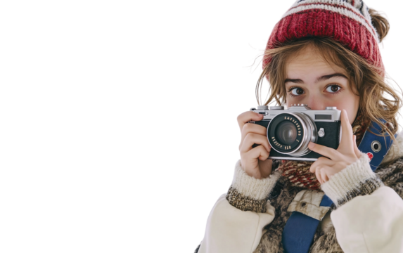 Young teenage girl holding an old-fashioned camera showing her passion for photography and style isolated on transparent background PNG - Powered by Adobe