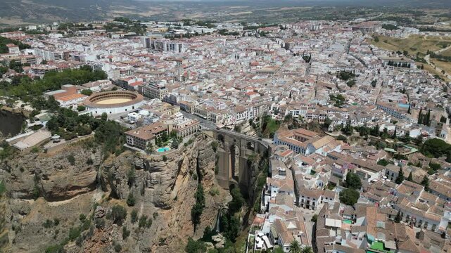 Aerial view from a drone of beautiful Puente Nuevo and the city view in Ronda, Spain in sunny summer weather