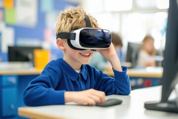 A young boy in a classroom enjoys an immersive experience using a virtual reality headset and computer mouse.
