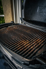 dirty grill burned in fat grease