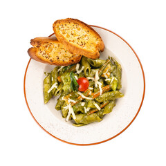 Penne pasta in green pesto sauce top view on a Transparent PNG Background