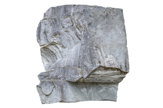 Large monolithic multilayer light gray stone pedestal granite marble block isolated on white background closeup.