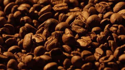 Roasted coffee beans forming a textured brown