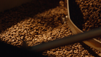 Coffee beans roasting in a large industrial coffee