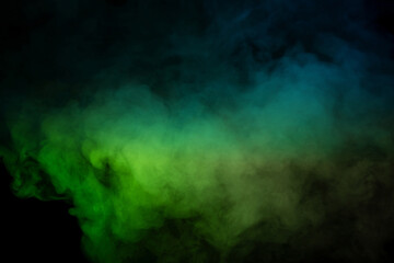 Blue and green steam on a black background.