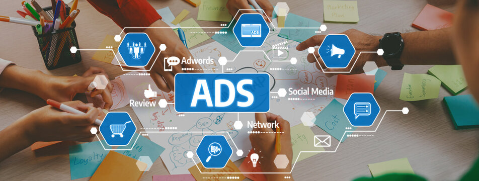 Professional startup group share creative marketing idea by using mind map. Young skilled business people brainstorm business plan while writing sticky notes. Focus on hand. Closeup. Variegated. Amity
