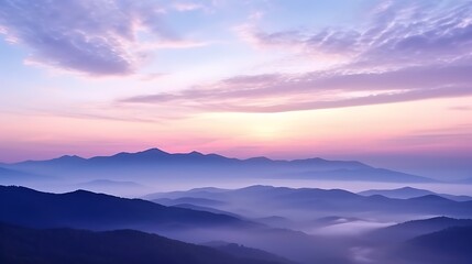 Obraz premium A serene mountain sunrise, the sky softly transitioning from lavender to pale gold, Carpathian peaks in silhouette, faint layers of mist lingering in the valleys, a calm and peaceful scene.