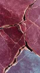 Rosso Levanto stone slab with weathered surface and burgundy tones in macro flat lay view