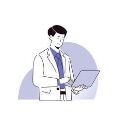 Young man in lab coat types on laptop with a focused expression