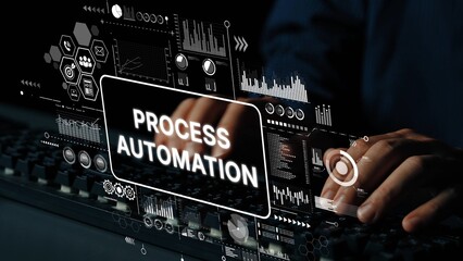 Hands on Keyboard with Process Automation Interface Displaying Data Visualizations and Digital...