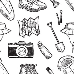 Seamless pattern with travel accessories in black brush stroke texture isolated on white. Hand drawn vector sketch illustration in vintage charcoal ink. Sleeping bag, camping, camera, map design