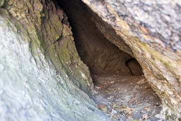 A small cave with a hole in the wall