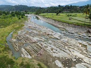 Wide Riverbed and Lush Farmland in Rural Aceh, Indonesia