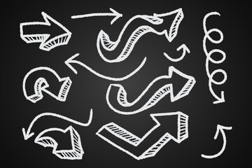 Hand drawn arrows icons set on a chalkboard