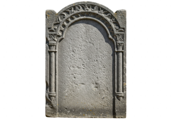 Ornate grey stone tombstone isolated on transparent background