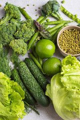 Fresh green vegetables in assortment top view. Healthy lifestyle, detox, flat lay.