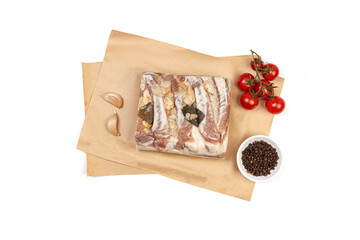 Traditional salted pork fat with spices isolated on white background