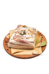 Traditional salted pork fat with spices isolated on white background