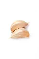 Fresh garlic cloves isolated on white background.
