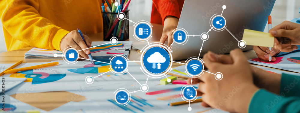 Poster this image captures a collaborative workspace where individuals engage in computing and cloud techno
