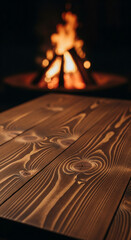 Obraz premium Dark brown wood texture, showcasing a natural grain pattern, with a blurred bonfire in the background, suggesting warmth, rustic ambiance and outdoor scene