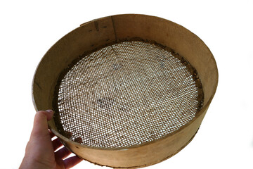 a fine-mesh sieve made of leather for sifting grain,