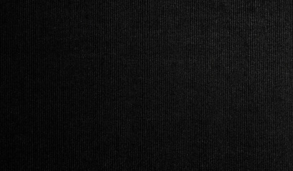 A high-resolution image of black felt fabric with a flat surface, showcasing its smooth and soft texture. The fabric is seamlessly captured, offering a seamless pattern perfect for design projects 