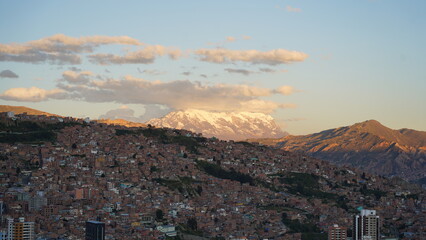 Aerial views of La Paz, Bolivia featuring the cable car system, city sprawl, and majestic...