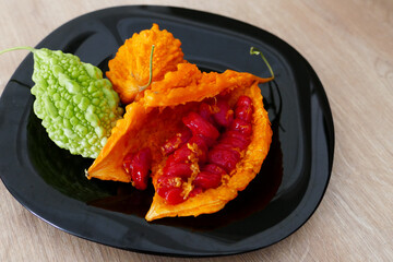 Momordica charantia (Mother melon) fruit and its seeds,