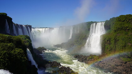 Fototapeta premium Stunning views of Iguazu Falls captured from various angles, showcasing the immense power, mist, and natural beauty of this iconic South American wonder
