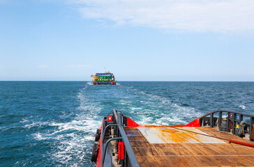 Sea towing of a non-self-propelled barge.