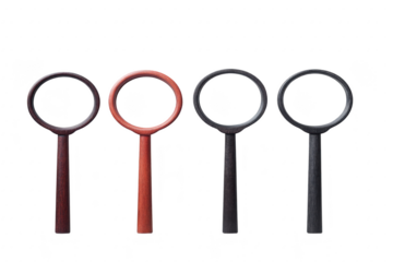 Four wooden magnifying glasses with round frames and handles are displayed in row, showcasing different shades of brown and black. minimalist design emphasizes simplicity and elegance