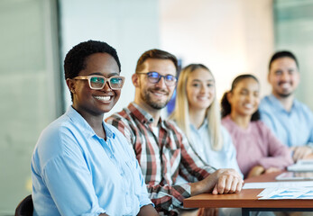 Group portrait of young happy businesspeople team in the office