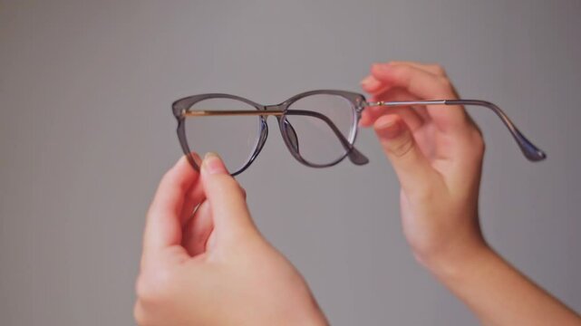 Demonstration of how to properly adjust eyeglasses with detailed step-by-step instructions