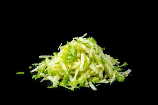 Shredded Iceberg Lettuce on Black
