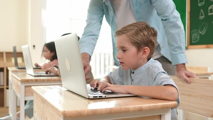 Caucasian teacher helping energetic boy coding engineering prompt while diverse student using software generated AI. Children sitting and programing system. Cute student learning about code. Pedagogy. - Powered by Adobe
