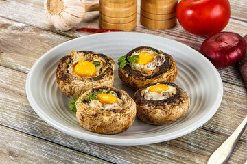 Baked champignon with quail egg