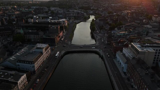 Stunning golden hour view of Cork City along the river