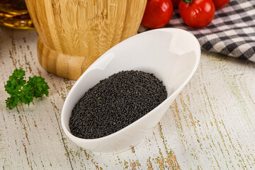 Black dry Nigella seeds in the bowl