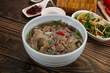Vietnamese Pho Bo soup with beef and noodles
