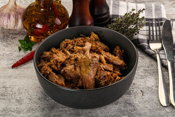 Shredded slow cooked pork meat