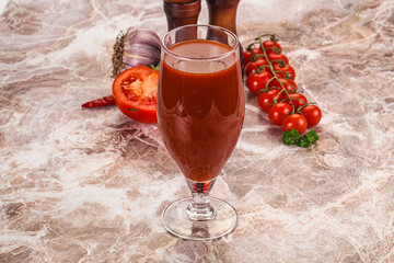 Fresh tomato juice in the glass