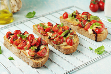 Freshly made bruschetta sandwiches - traditional dish of Italian cuisine