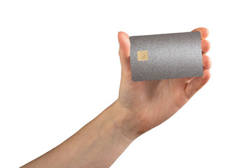 Bank card in hand, with debit or credit card and chip for secure payment. Financial service, online