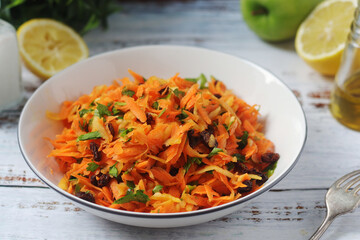 A bowl with traditional Polish carrot salad  © nastyakamysheva