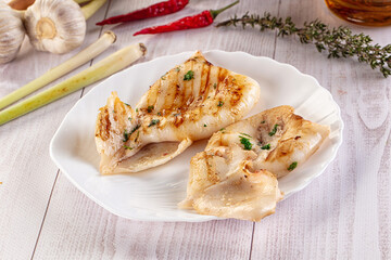 Fresh grilled calamari with herbs